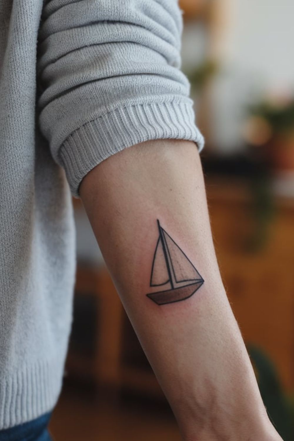 Small Sailboat Wrist Tattoo Ideas for Women