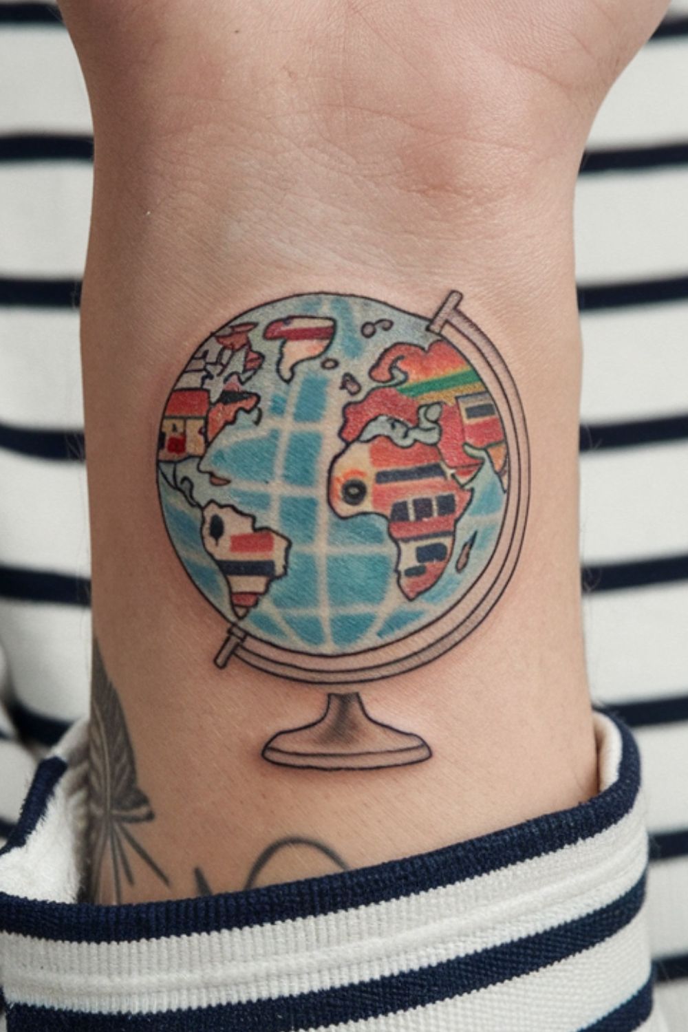Small Globe Wrist Tattoos for Women