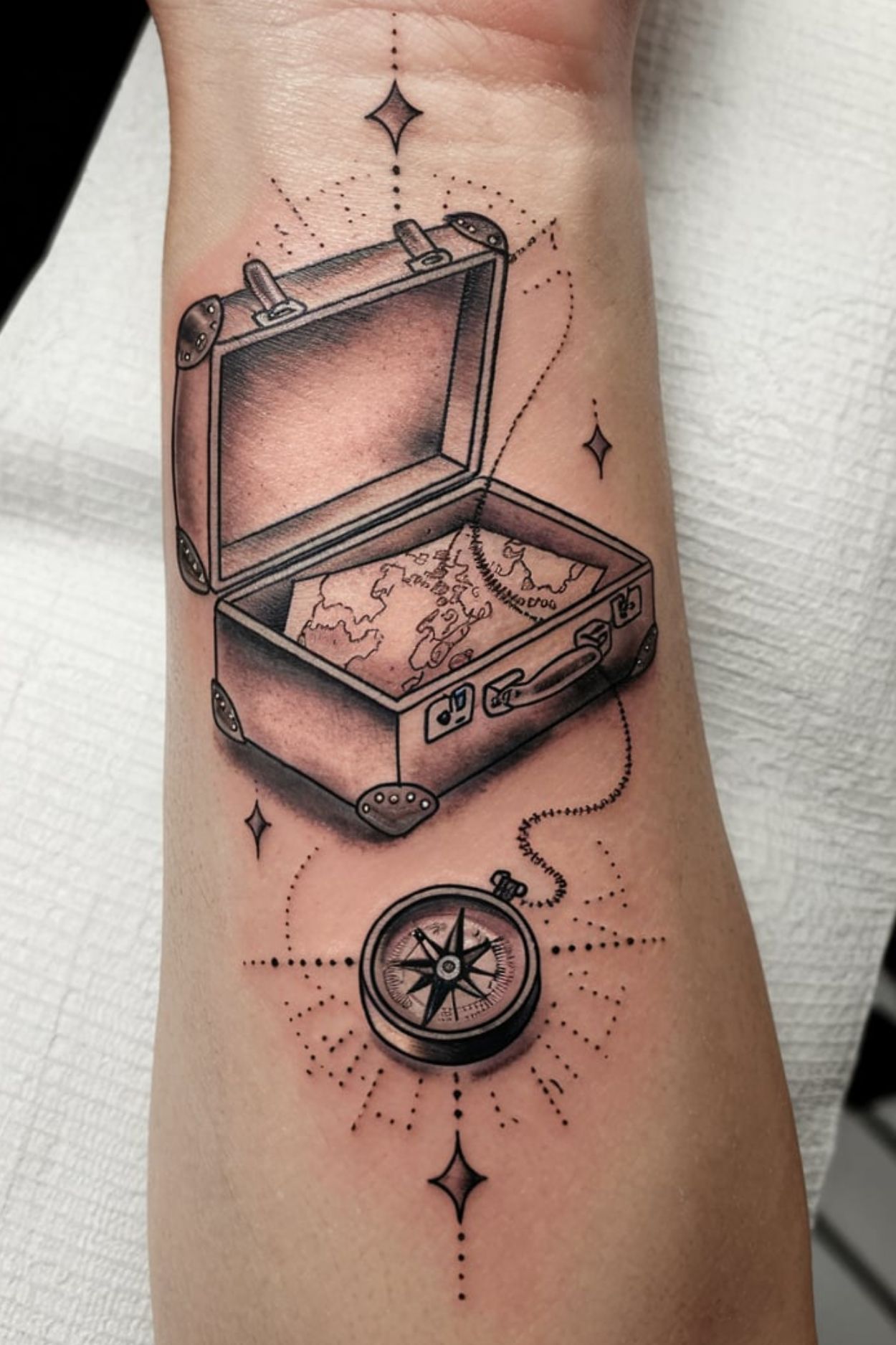 Small Suitcase Wrist Tattoo Ideas for Women 