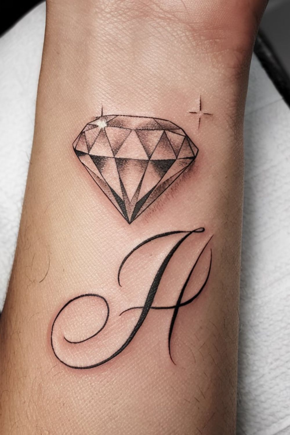 Diamond & Initial Wrist Tattoo