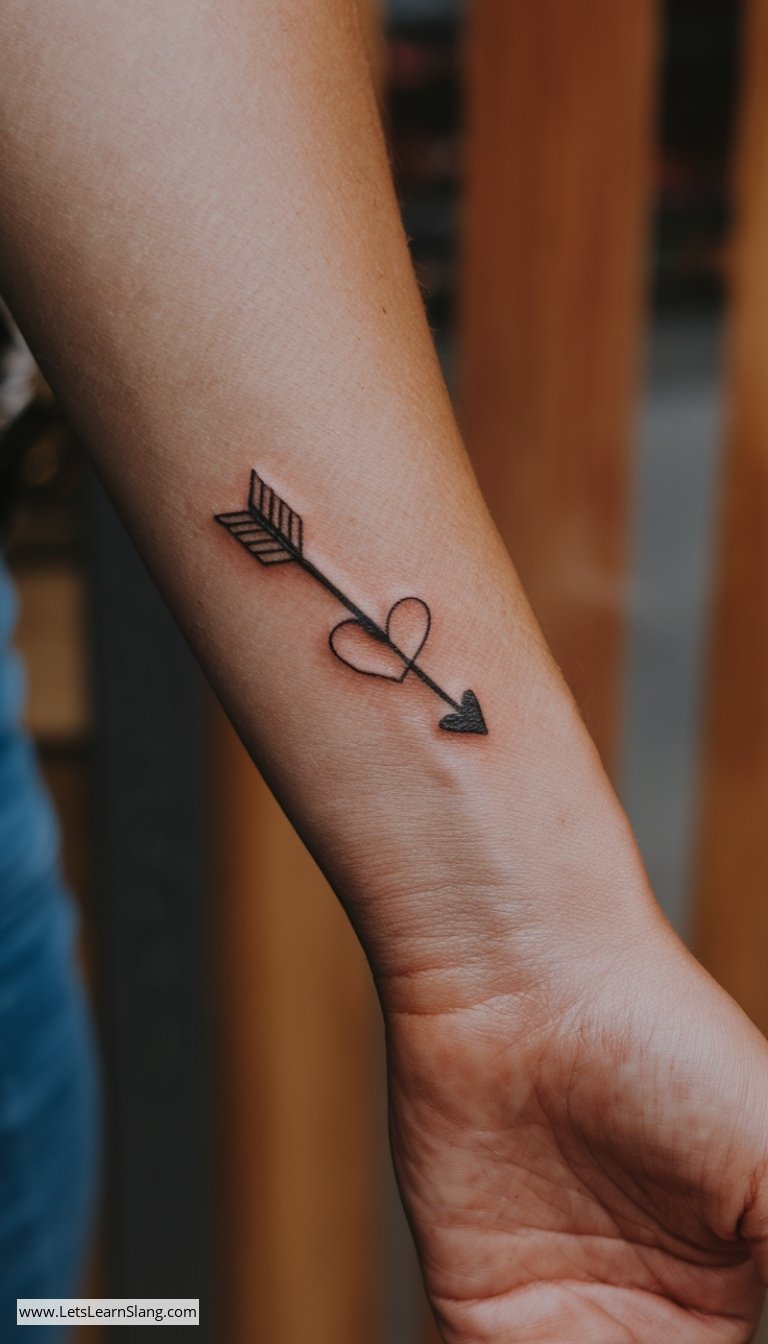 Heart Pierced Arrow Wrist Tattoo