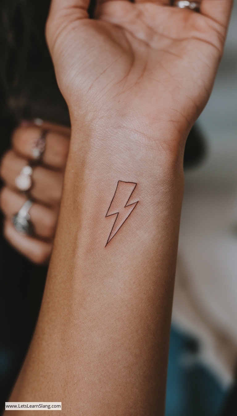 Metallic Lightning Bolt Wrist Tattoo