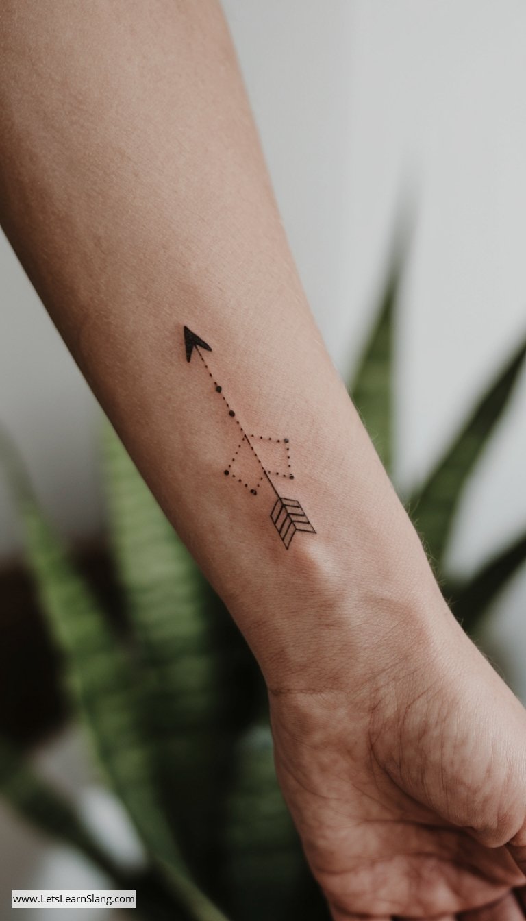 Minimalist Dotted Arrow Wrist Tattoo