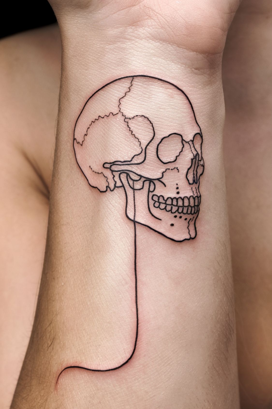 Small Skull Wrist Tattoo Ideas for Women