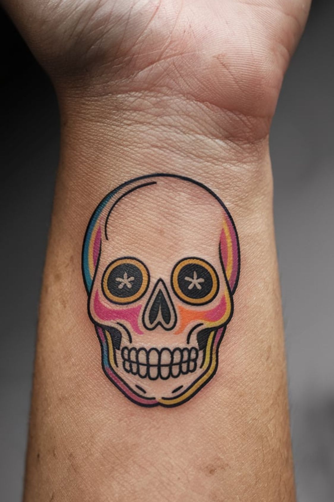 Small Skull Wrist Tattoo Ideas for Women