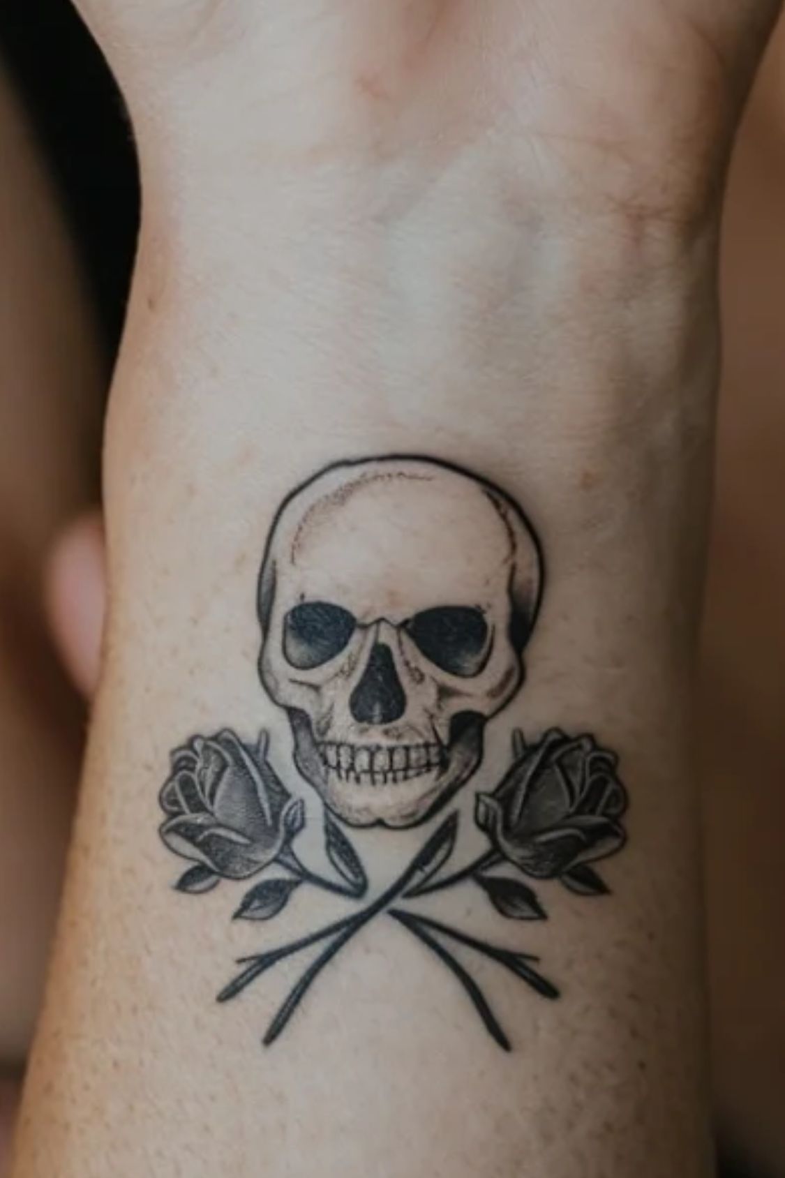 Small Skull Wrist Tattoo Ideas for Women