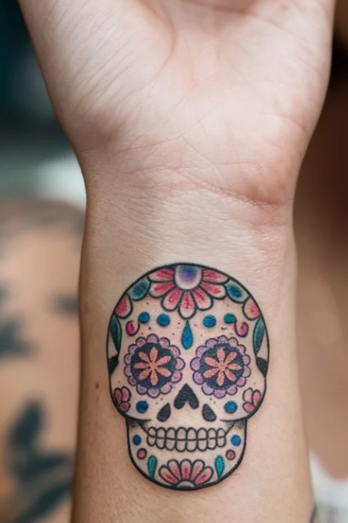 Small Skull Wrist Tattoo Ideas for Women